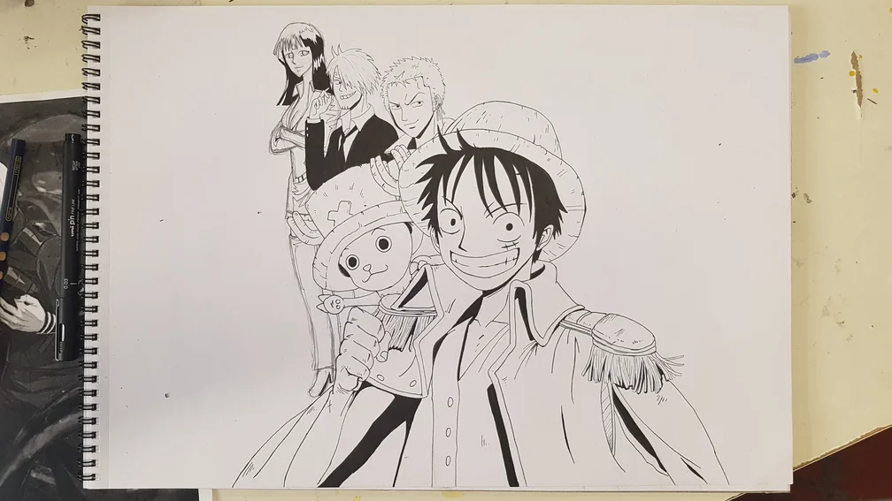 Dessin à l'encre de personnages manga réalisé par un enfant